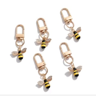 Chaveiro com pingente de abelha/dourado/Chaves/estojo/mochila/bolsa/acessórios/Mel/inseto/borboleta/flor/flores em Oferta na Shopee