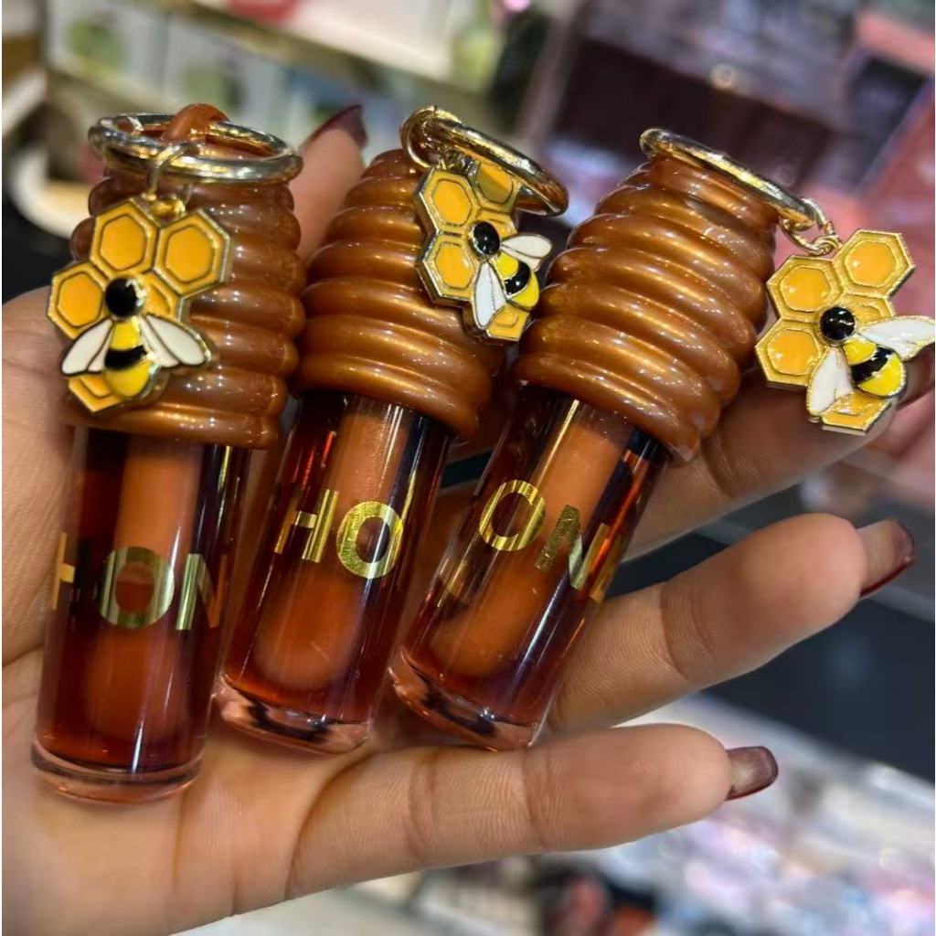 kit 10 unidade Gloss Labial Hidratante Mel Chaveiro Lua E Neve Lip Gloss 368