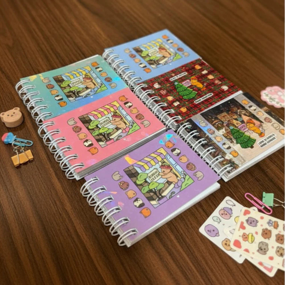 kit 10 mini livros ilustrados com  holográfica criativa, totalizando 42 páginas (incluindo um pingente e um chaveiro). em Oferta na Shopee