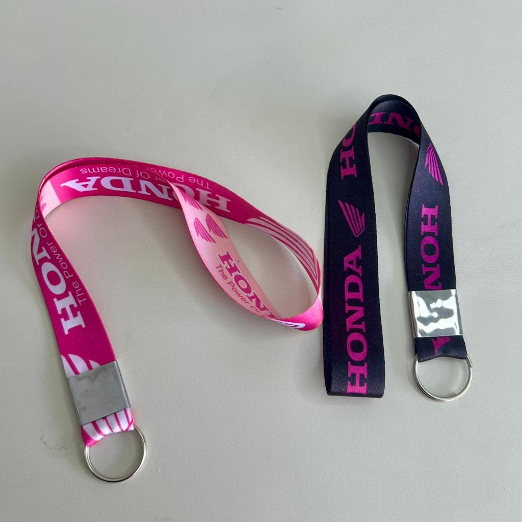 KIT 2 CHAVEIROS MOTO HONDA - CORDÃO / PRETO E ROSA em Oferta na Shopee