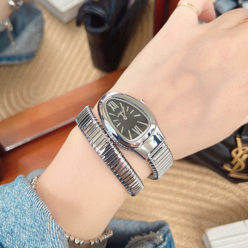 "Relógio Feminino Dourado com Pulseira Cobra – Design Escultural + Caixa Presente Elegante"