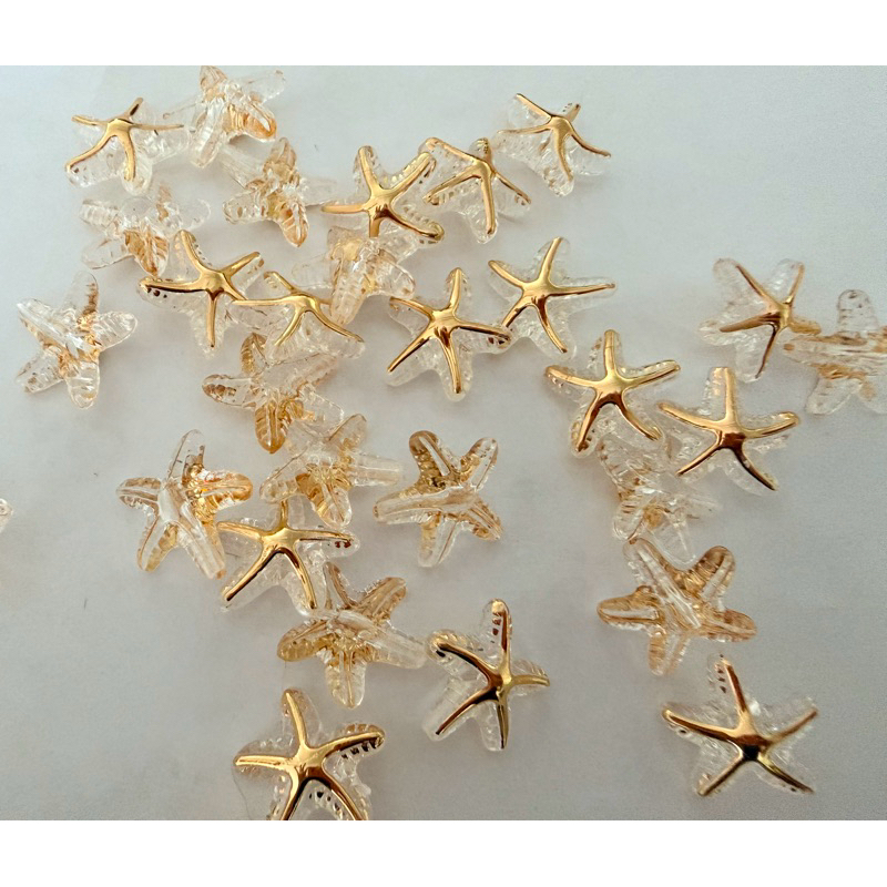 Entremeio estrela do mar 18mm cristal com dourado / mar / praia