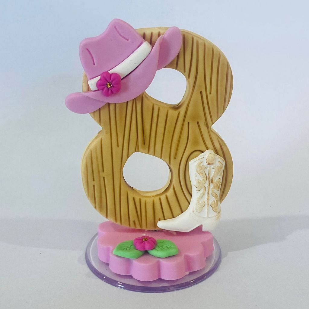 Vela decorativa em biscuit Ana Boiadeira para festa aniversario temático c/ pavio magico em Oferta na Shopee
