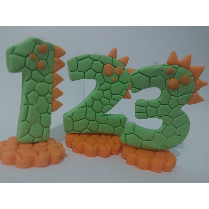 Vela aniversario biscuit dino dinossauro baby verde claro vela com pavio em Oferta na Shopee