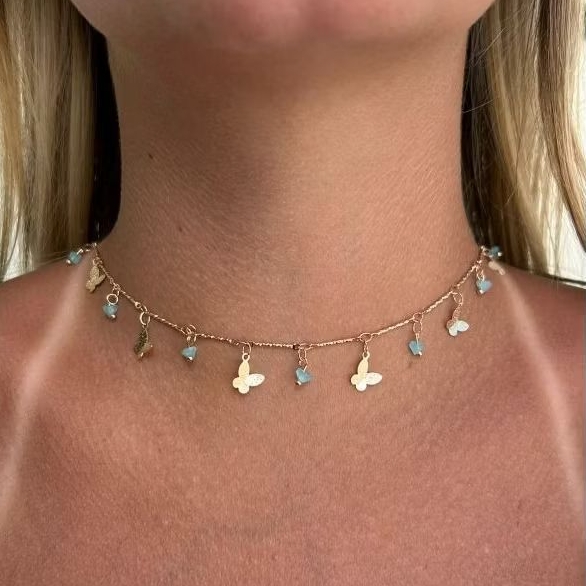 Choker dourada borboletas e pedras azuis