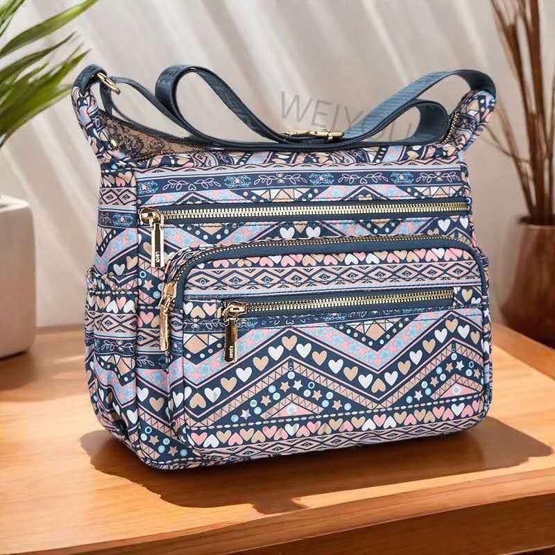Esta nova bolsa feminina impermeável em fibra sintética com estampa floral também pode ser usada como bolsa transversal. em Oferta na Shopee