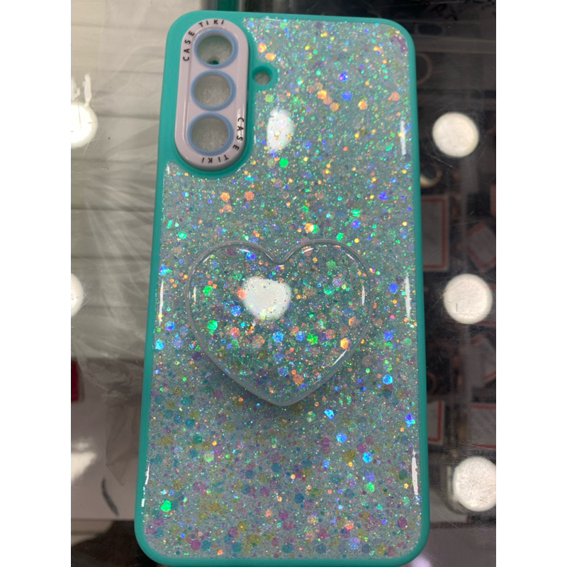 Capa Glitter Holográfica com Coração 3D para Samsung Galaxy A16 – Antichoque Luxo