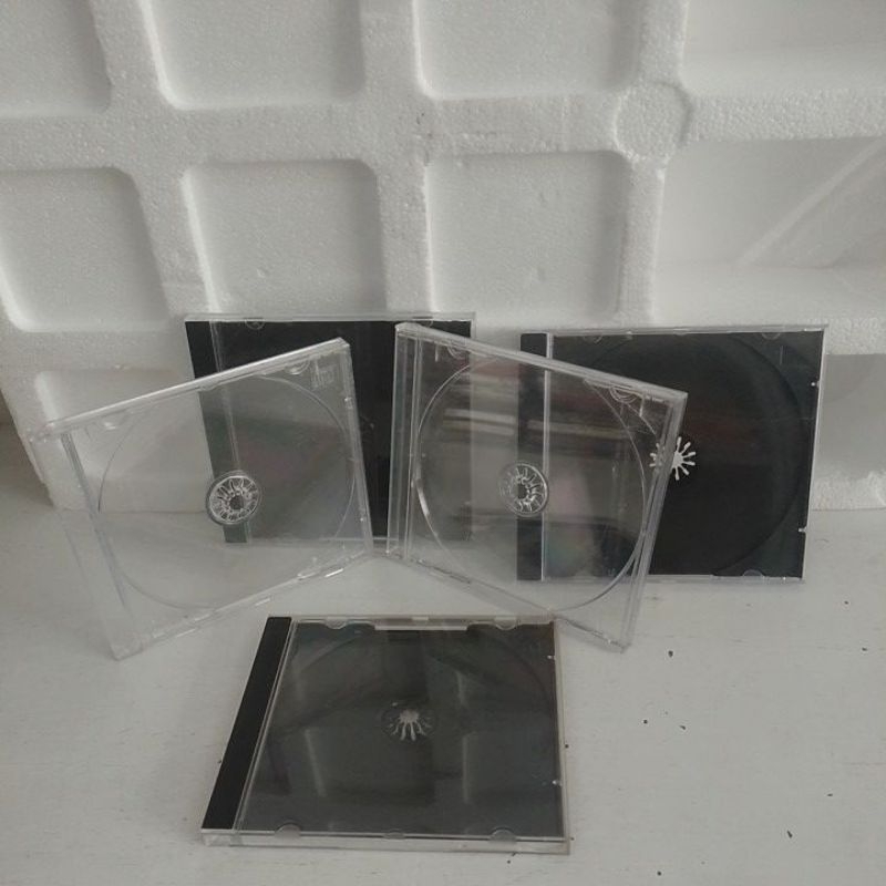 lote com 5 caixinhas pra colocar CDs de acrílico usado.015
