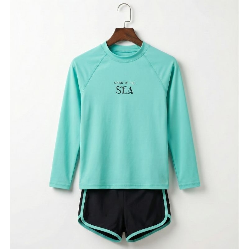 Conjunto Praia Juvenil Feminino Manga Longa UV 50+ em Poliamida Térmica com Short Forrado de natação