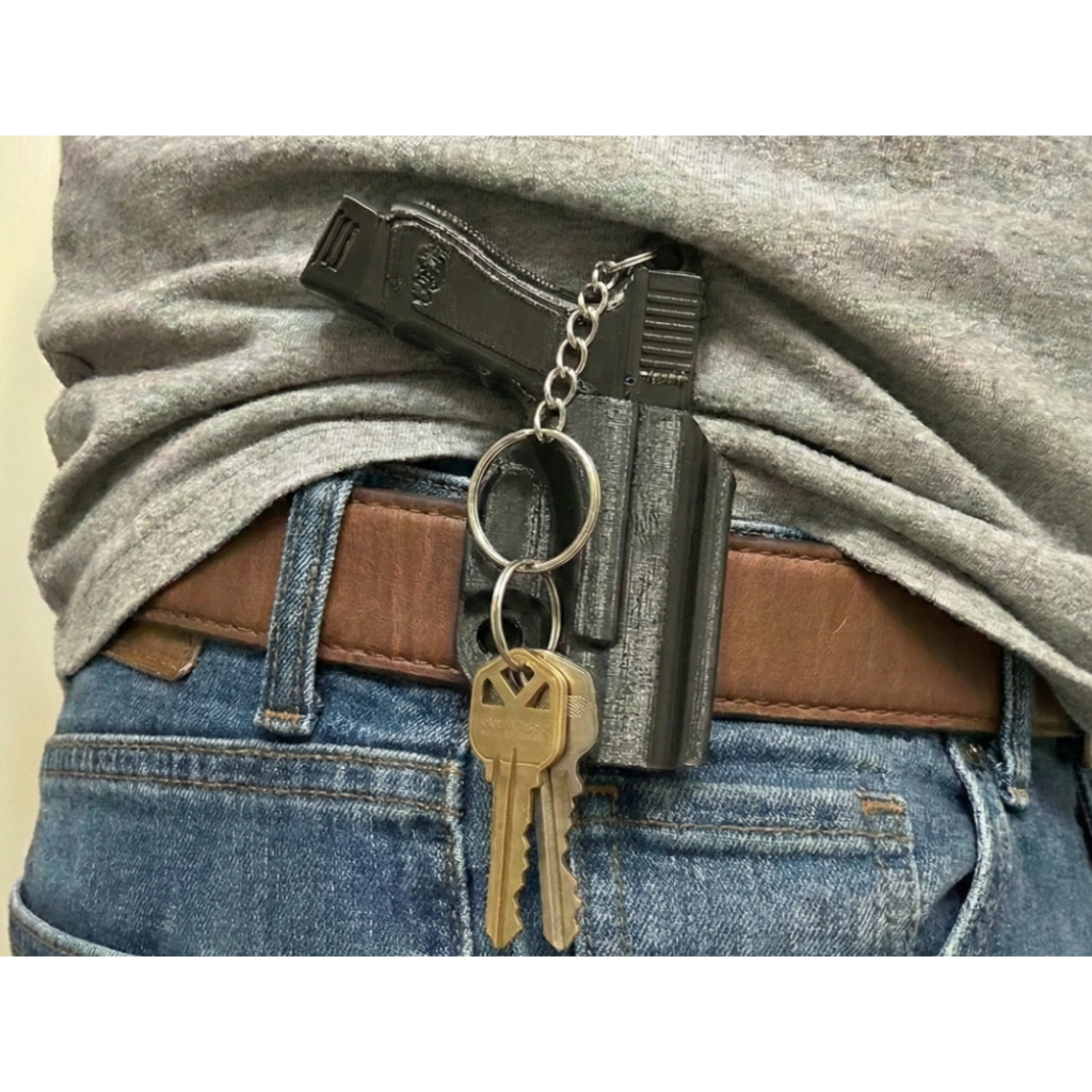 Chaveiro Porta-Chaves Formato Pistola com Clipe de Cinto – Suporte Criativo e Resistente