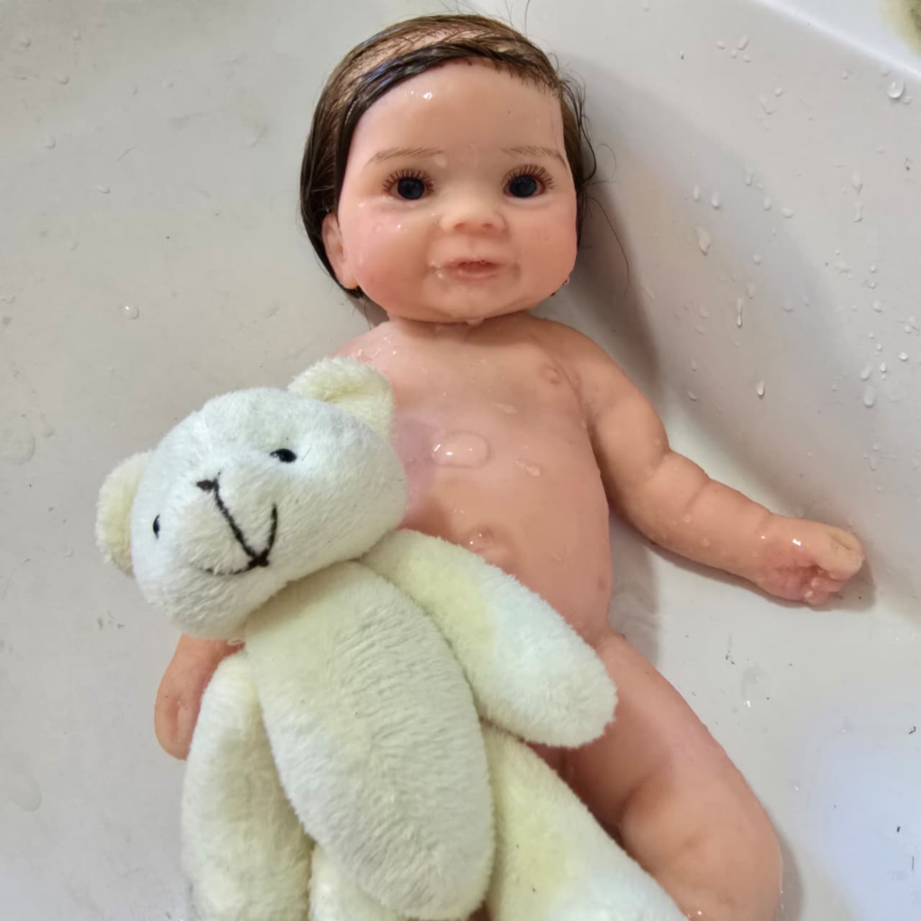 Bebê Reborn Silicone Sólido Molinha Mama Faz Xixi Pode Dar Banho Hiper Realista Cabelo Fio a Fio