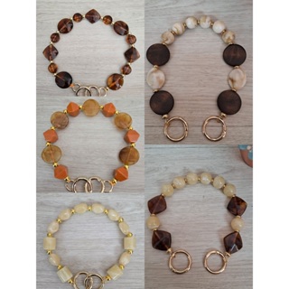 Alça de bolas de resina para bolsas com argola articulada dourada p em Oferta na Shopee