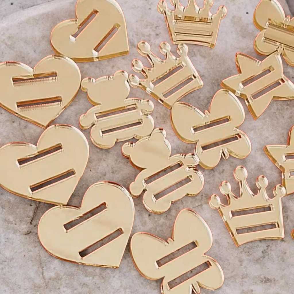 Kit 50 UN Aplique Finalizador de Laço e Agenda - 5 Modelos Apliques Finalizadores Passante Elástico