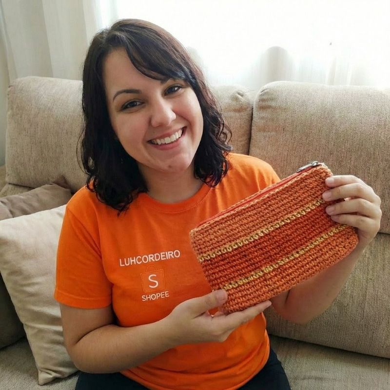 Desapego clutch laranja le lis blank
