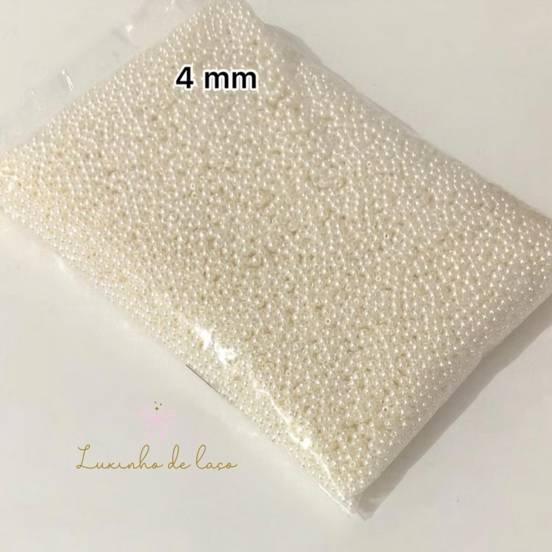 Pérola inteira com furo ABS 3,4,5,6,8mm branca e off 50gramas em Oferta na Shopee