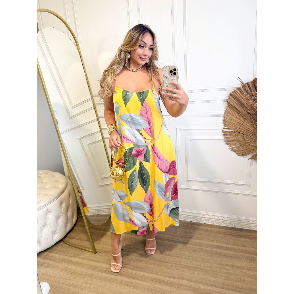 Vestido  Estampa fundo amarelo com folhas grandes detalhe nas alças soltinho e confortavel