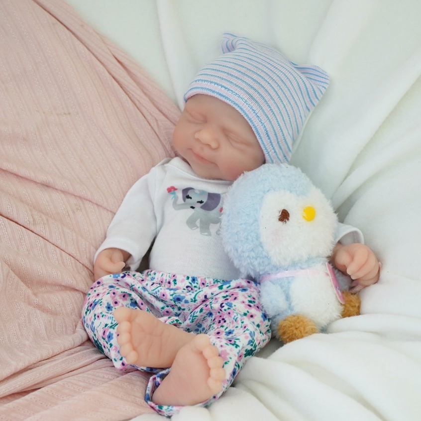 Bebê Reborn Menina de Silicone Sólido 35cm Olho Fechado Pele Suave com Acessórios em Oferta na Shopee