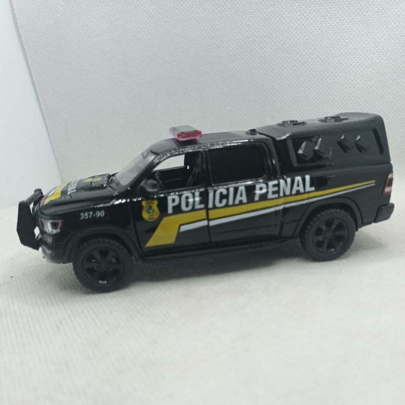 Miniatura de viatura da polícia penal de Goiás.