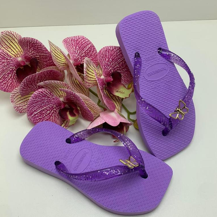 chinelo infantil feminino colorido injetado alça com detalhe borboleta