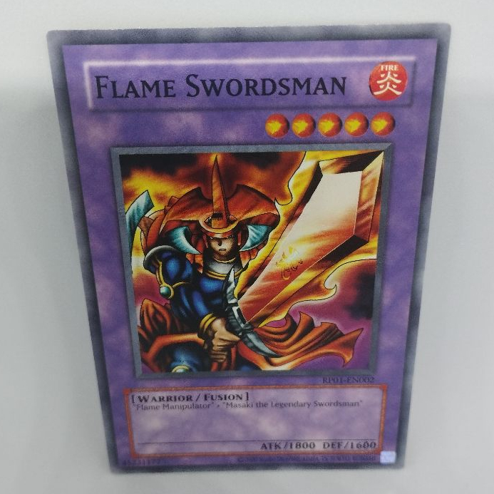 Guerreiro da Espada de Chama Dourada (Espadachim das Chamas) Original - Carta Yugioh