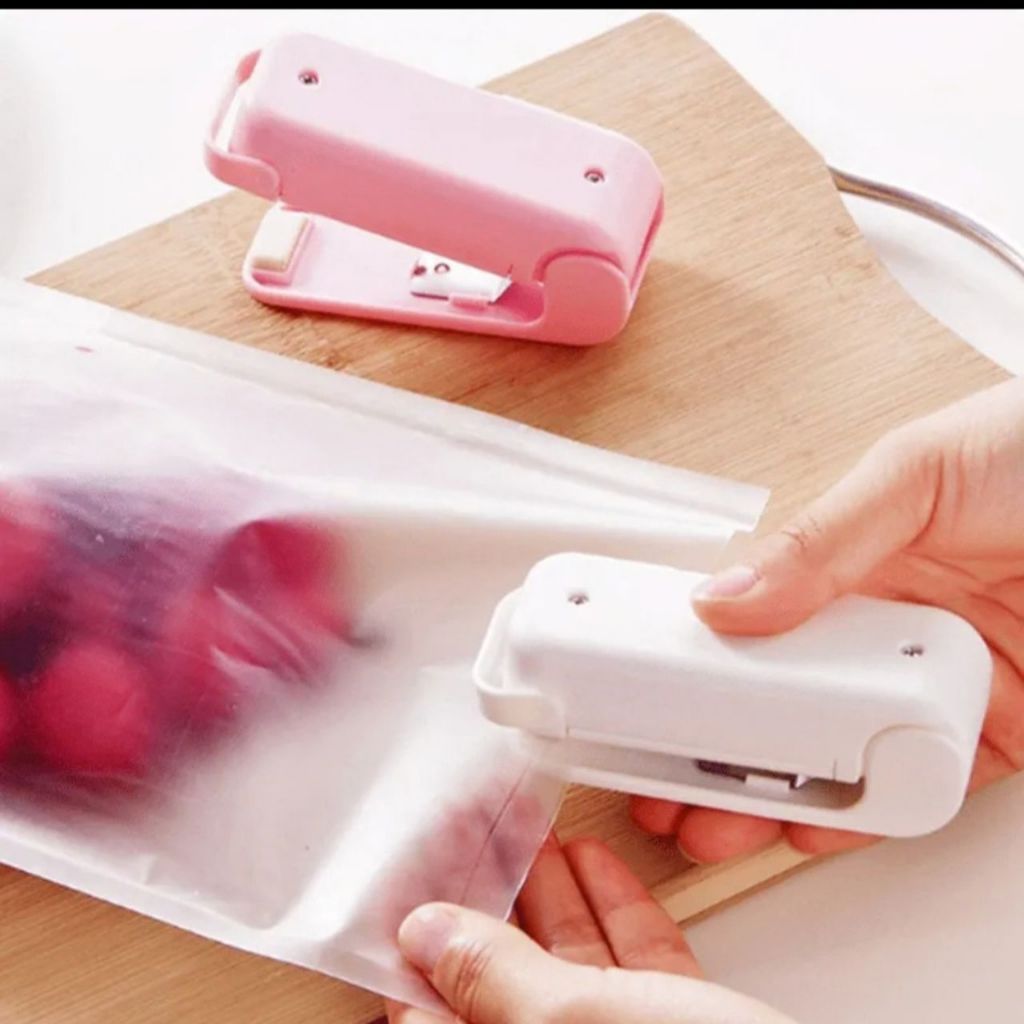 Mini seladora De embalagem Plástica Portátil Á Pilha Vedaçaô  (não acompanha a pilha) Lacra E Fecha Imã de Geladeira