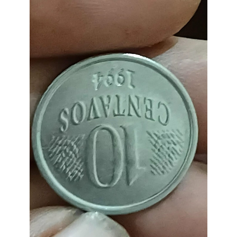 moeda 10 centavos da 1 família do real com cunho trocado de 5 centavos e reverso invertido