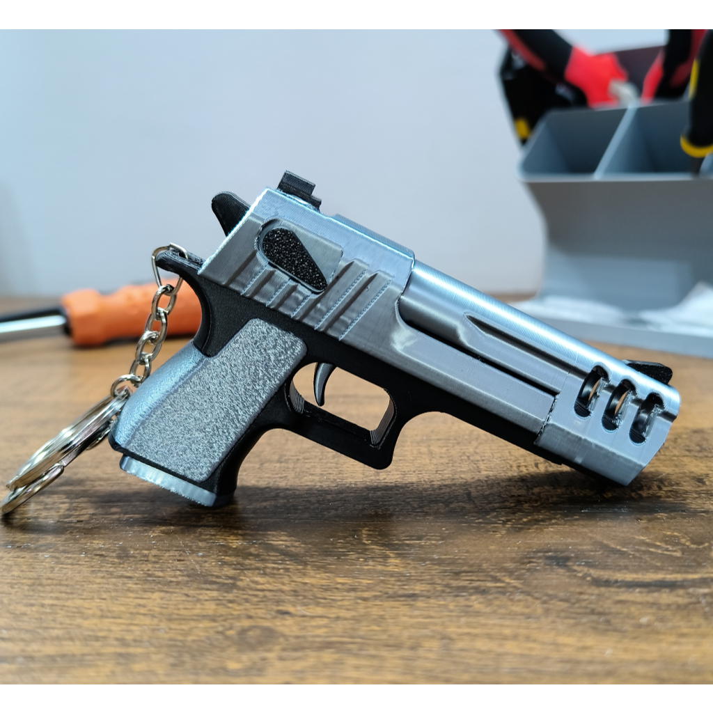 Chaveiro Fidget Desert Eagle ou Glock – Estilo, Movimento e Diversão na Palma da Mão!