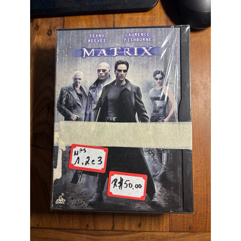 Matrix, Matrix Reloaded e Matrix Revolutions - 3 filmes em DVD da Warner Bros