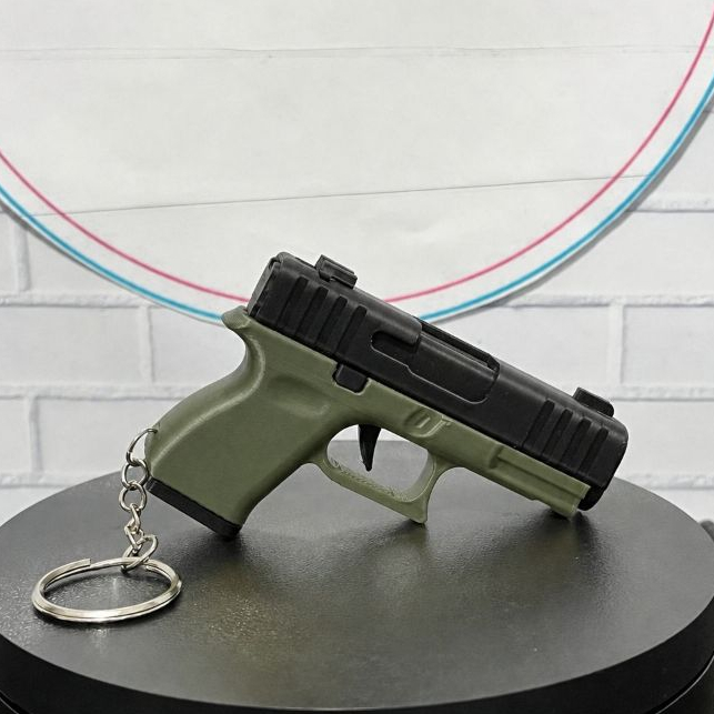 CHAVEIRO ARMINHA ARTICULADA-ESTILO GLOCK VERDE OLIVA-MINI ACESSÓRIO-CHAVES-BOLSAS-ACESSÓRIO MILITA-TÁTICO-MILITAR