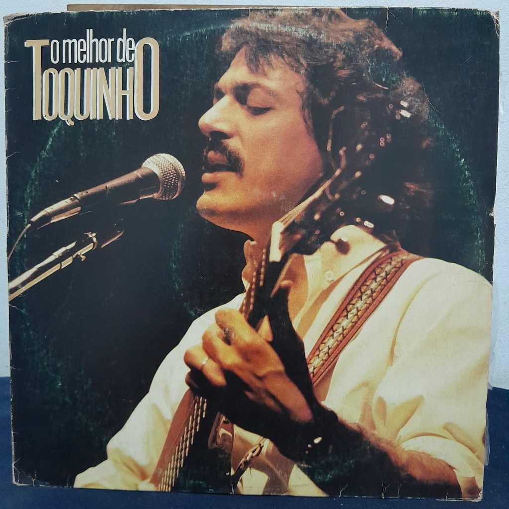 LP O MELHOR DE TOQUINHO 1989 / COLETÂNEA REUNINDO ALGUNS DOS PRINCIPAIS MOMENTOS DA CARREIRA DO CANTOR, COMPOSITOR E VIO