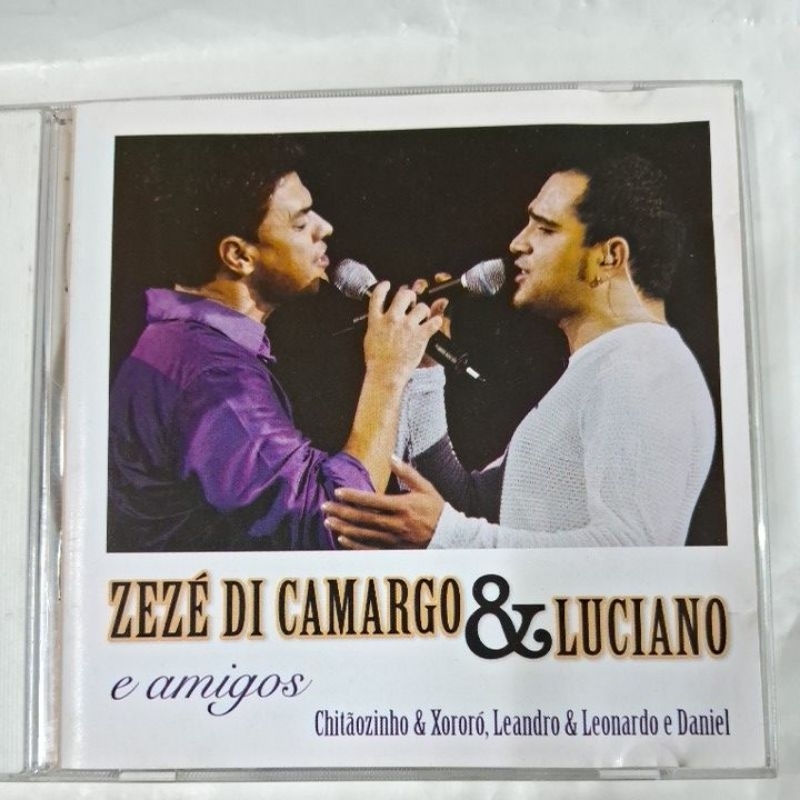 CD- ZEZÉ DI CAMARGO & LUCIANO = E AMIGOS CHITÃOZINHO & XORORÓ, LEANDRO & LEONARDO E DANIEL ( USADO) LEIA A DESCRIÇÃO