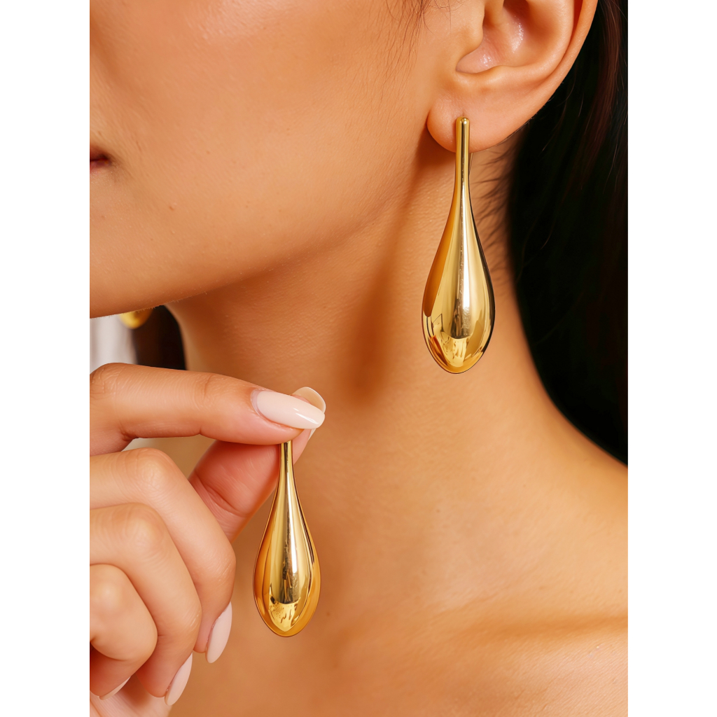 Brincos modernos com pingentes em formato de gota, disponíveis em ouro polido e prata. em Oferta na Shopee