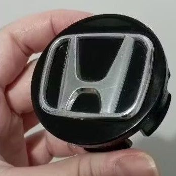 uma calota miolo meio roda honda city preto com prata  2004 a 2011