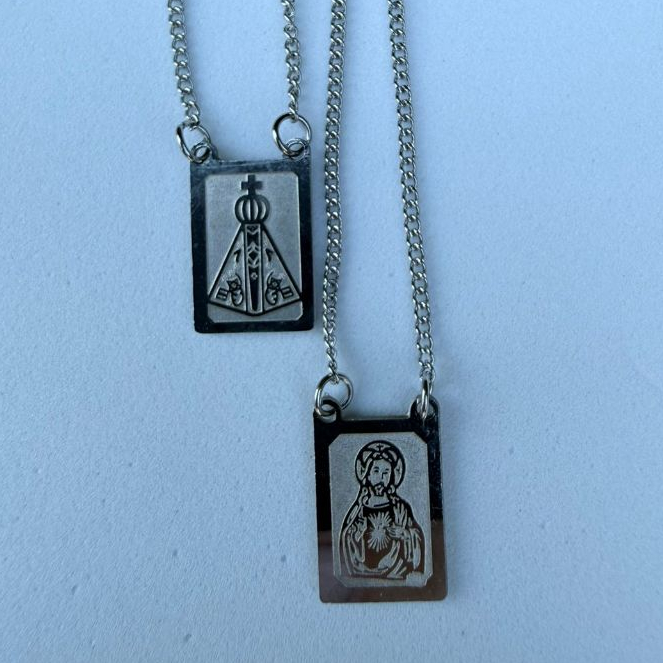Escapulário Religioso Inox Fé Proteção Nossa Senhora Aparecida e Jesus em Oferta na Shopee
