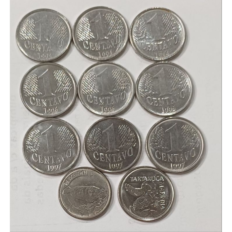 9 moedas de 1 centavo da 1a família do real 3 de 94, 3 de 96 e 3 de 97 mbc brinde uma do peixe boi e uma da tartaruga