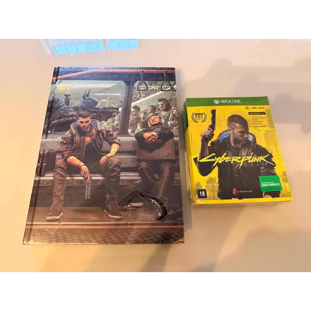 Kit The Cyberpunk 2077: Complete Official Guide - Collector's Edition e Cyberpunk 2077 - Steelbook - Xbox