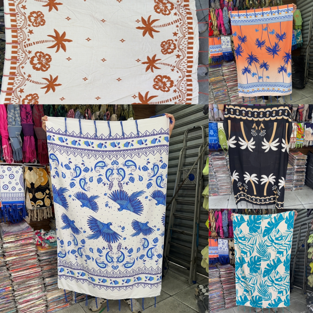Canga de Praia Feminina Poliéster Estampada Multicolorida com Variações de Estampas