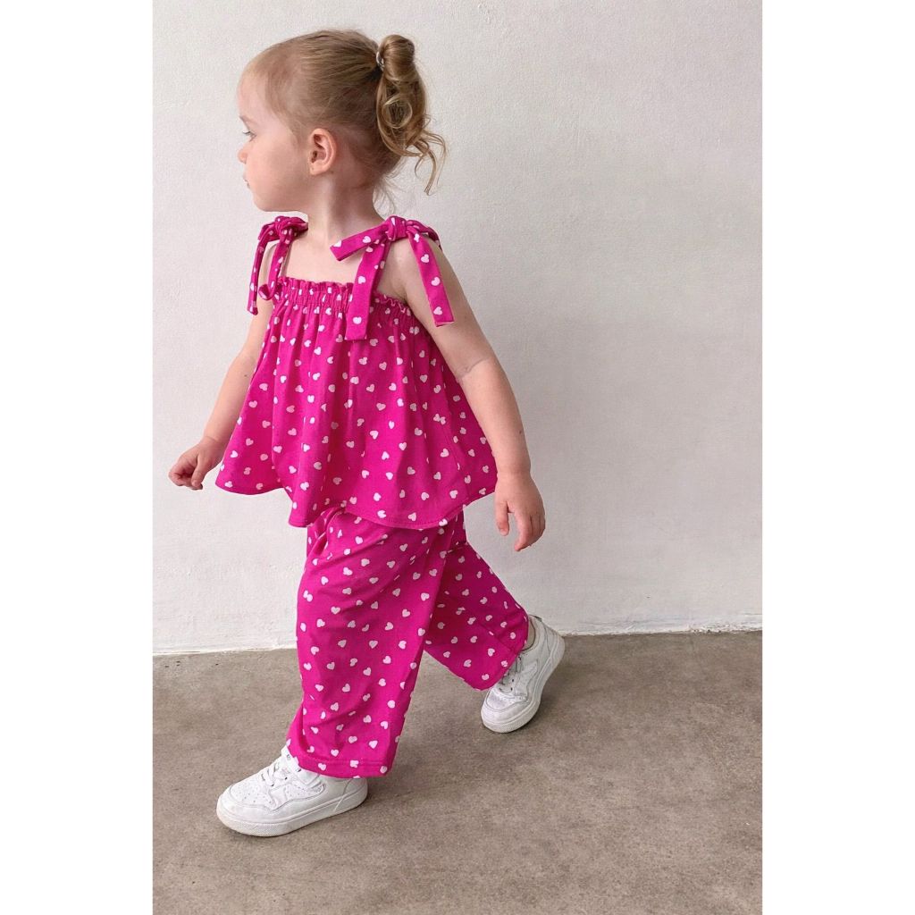 CONJUNTO INFANTIL MENINA FRANZIDO SOLTINHO E CALÇA COM TECIDO ROSA DE POÁ DE CORAÇÃO FASHION em Oferta na Shopee