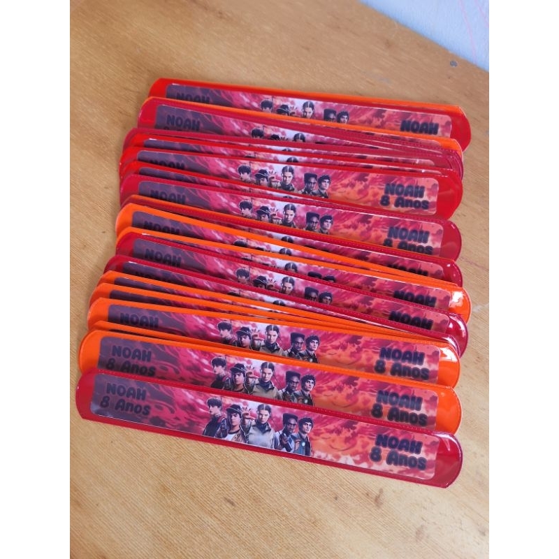 kit 10/15/20/30 Pulseira bate enrrola personalizada - Fazemos Qualquer tema /stranger things