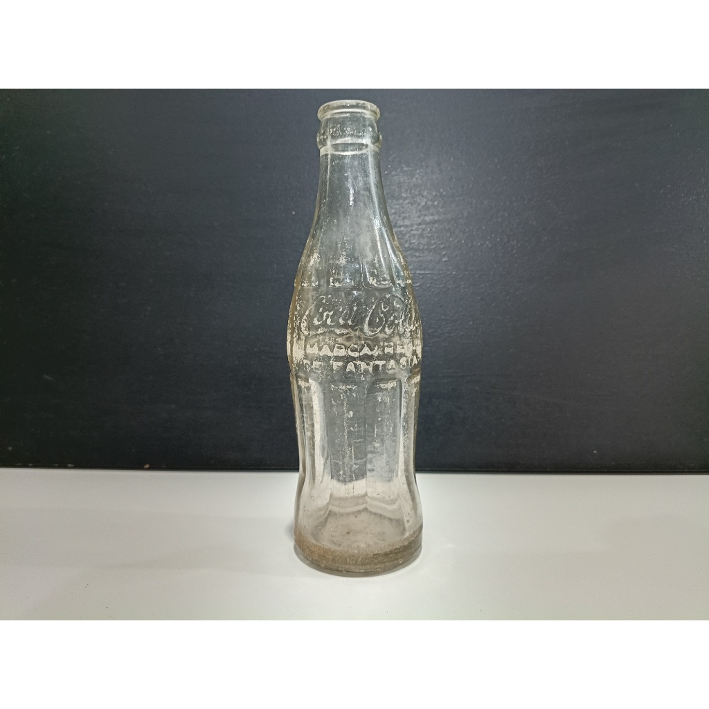 Garrafa antiga de vidro Coca Cola anos 1950