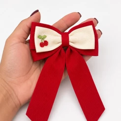 Laços de cabelo infantil com pontas cereja vermelho