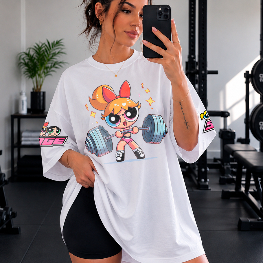 Camiseta Oversized Ampla Estilosa Streetwear Longline Moda Fitness GYM Academia Girls Power Meninas Poderosas Cartoon