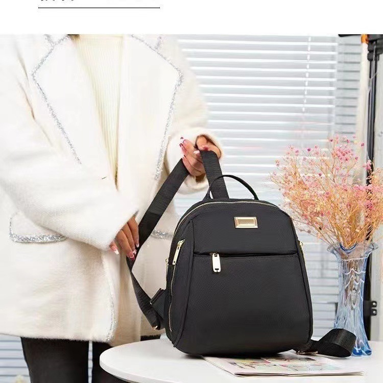 Mochila pequena de lona para mulher, em tecido Oxford impermeável, resistente e durável, ideal para o trajeto diário