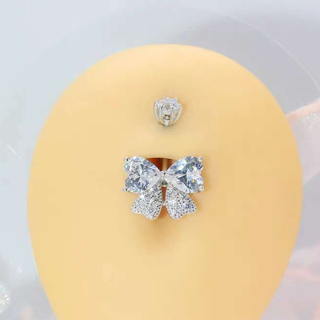 Piercing de Umbigo Laço/ Coração Cravejado e com Pedra Prata - 01#