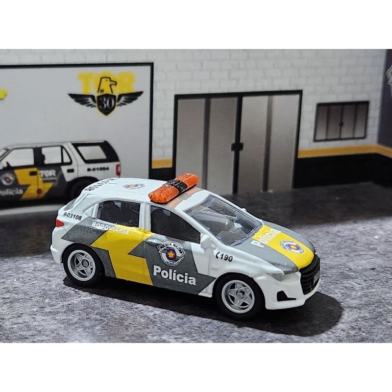 CHEVROLET ONIX VIATURA POLÍCIA MILITAR RODOVIÁRIA SP TOR  ESCALA 1.64 TAMANHO 7CM CKS ACOMPANHA EMBALAGEM DE ACETATO NEW
