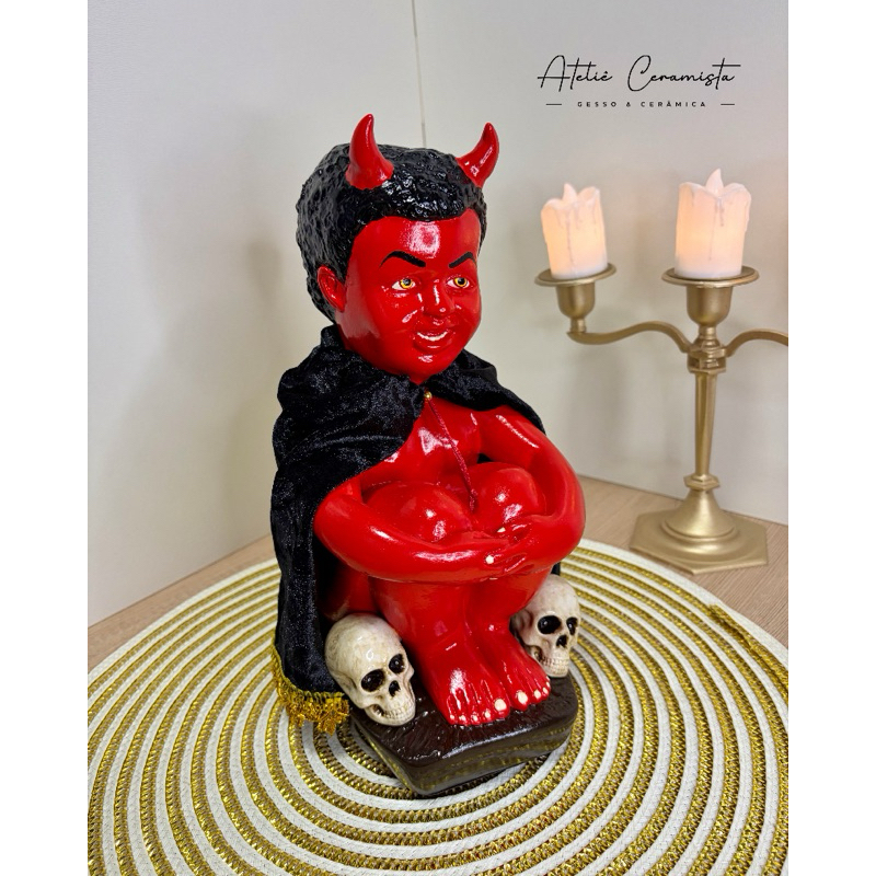 imagem exu mirim caveirinha com capa em gesso 27cm