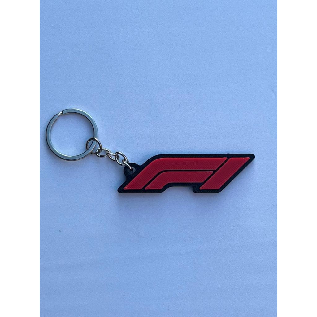 Chaveiro F1 logo presente