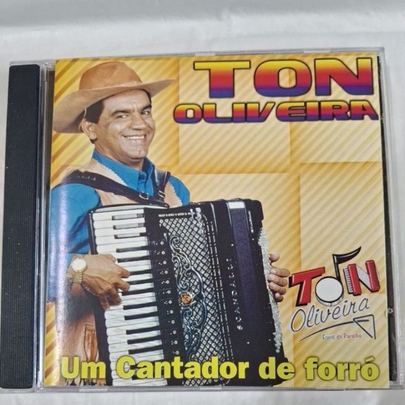 CD- TOM OLIVEIRA = UM CANTADOR DE FORRÓ (USADO) LEIA A DESCRIÇÃO