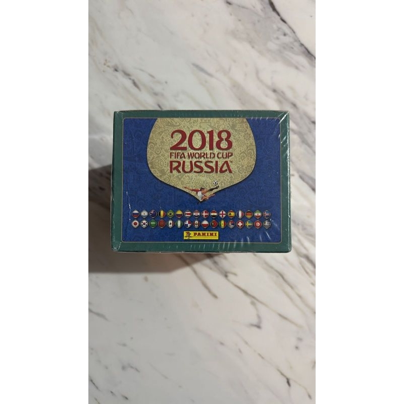 caixa fechasa e celada de figurinhas Panini da copa do mundo Rusia 2018