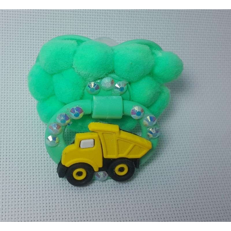 Chupeta bico Erê pompom verde carro amarelo Oxum/Oxossi/Logunedé criança cosme ibeji umbanda Candomblé